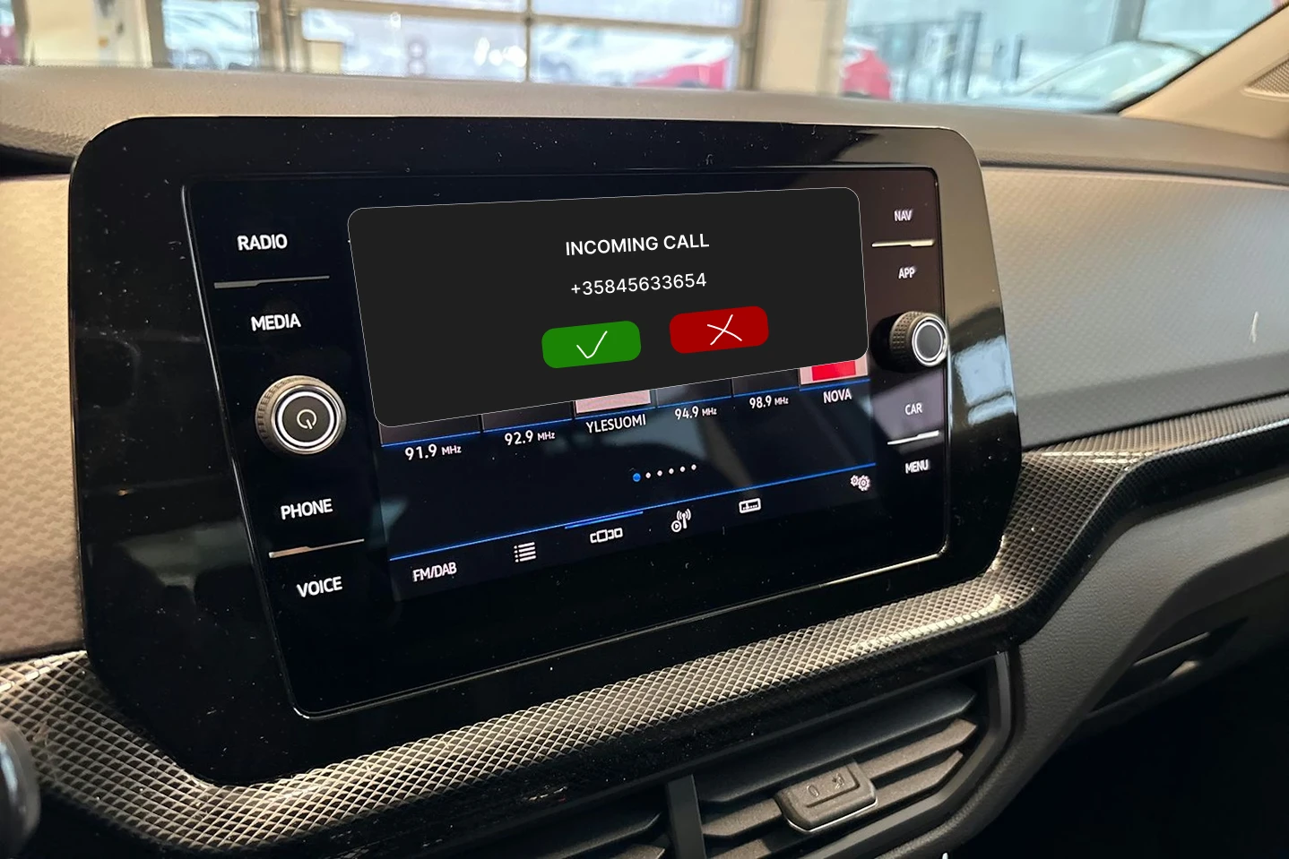 Proposed Volkswagen T-Cross incoming call interface with a larger caller area and larger accept and decline buttons.